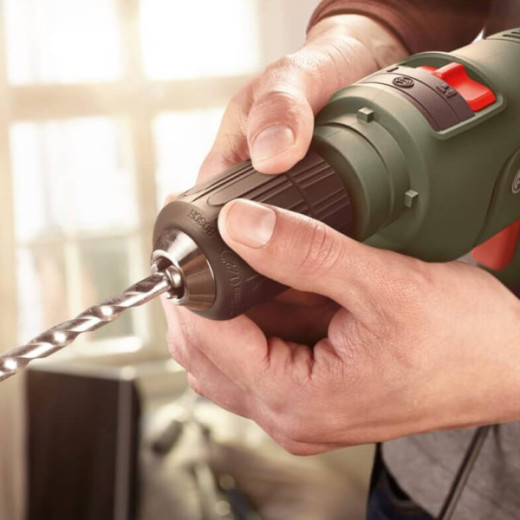 Bosch EasyImpact 600, ударний дриль 600 Вт, патрон 13 мм, реверс, регулювання обертів, кейс - 0.603.133.020