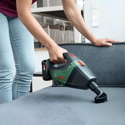 Bosch UniversalVac 18, акумуляторний пилосос 18 В, контейнер 1,5 л, продуктивність 1980 л/хв, комплект із зарядним пристроєм та акумулятором 2.5 Ah - 0.603.3B9.103